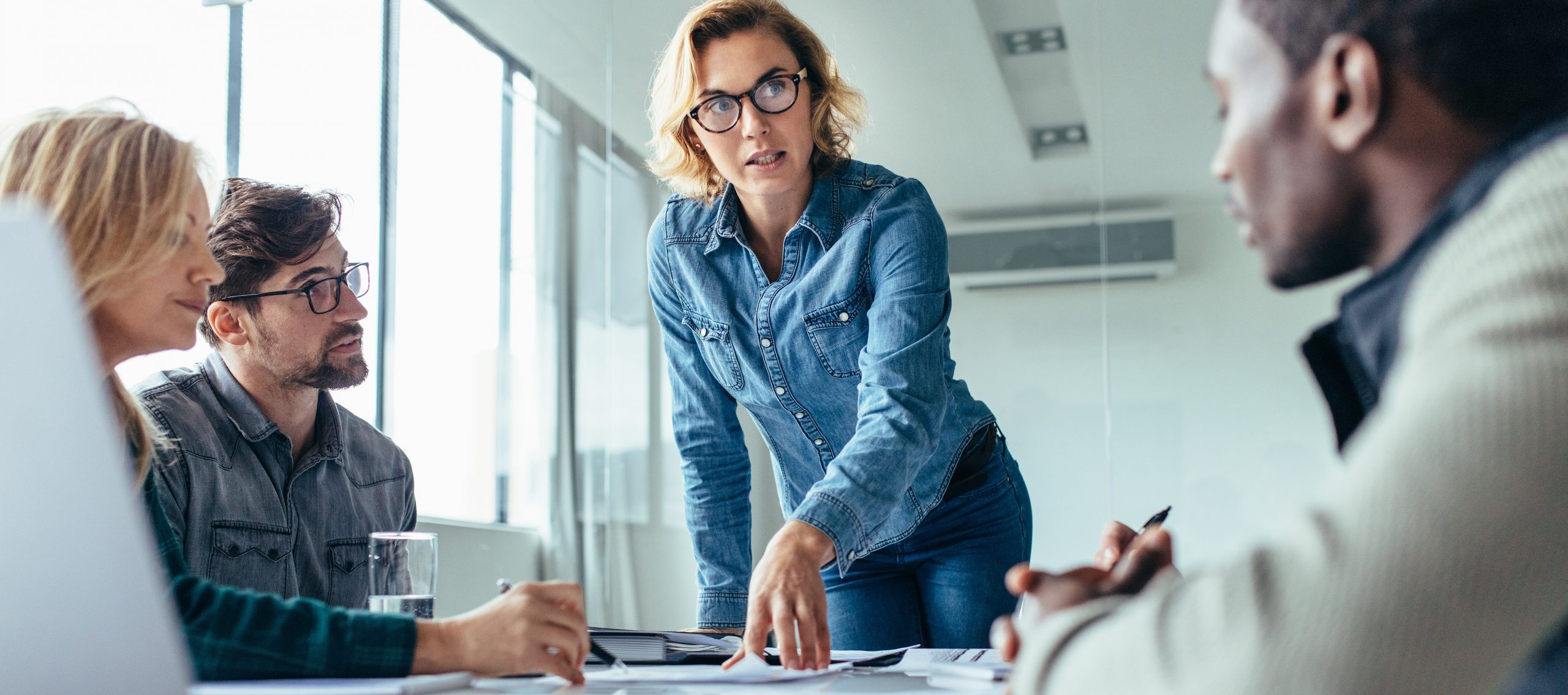 Businesswoman leading business presentation